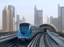 Dubai Metro train #5018, departing from the Burj Khalifa/Dubai Mall station.