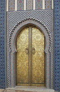 Islamic door decorated with geometric patterns in Morocco