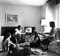 Image 18An American family watching television together in 1958. (from 1950s)