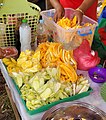 Sour unripe mangoes eaten with shrimp paste, salt, chili, vinegar or soy sauce in the Philippines
