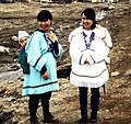 Two Inuit women wearing amautiit (skirted style, akuliq) in Nunavut (1995)