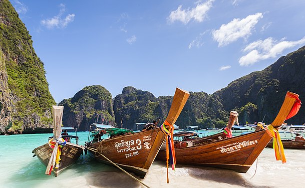 Long-tail boats in Maya Beach, Ko Phi Phi Lee, Thailand.