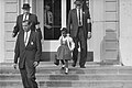 Ruby Bridges being escorted by U.S. Marshalls