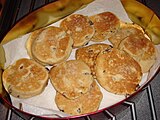 Welsh cakes are cooked on a griddle.