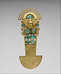Ceremonial knife/tumi (Sican); 10th–13th century; gold, turquoise, greenstone and shell; height: 33 cm; Metropolitan Museum of Art[65]