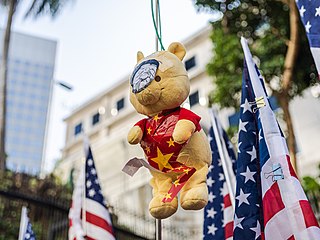 A Winnie the Pooh toy used to symbolise Xi Jinping with the Chinazi flag stuck to it