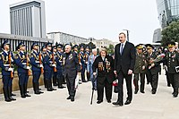 President Ilham Aliyev with war veterans in Baku in 2018.
