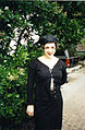 Image 21Woman dressed in black maxi skirt, top and hat, 1995. (from 1990s in fashion)