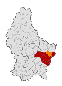 Map of Luxembourg with Manternach highlighted in orange, and the canton in dark red