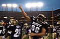 Navy celebrates after winning the game
