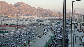 The camp of Mina on the outskirts of Mecca, where Muslim pilgrims gather for the Hajj (Greater Pilgrimage). Masjid Al-Khayf is visible to the right.