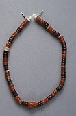 String of beads; 3300–3100 BC; carnelian, garnet, quartz and glazed steatite; length: 20.5 centimetres (8.1 in); by Naqada III culture Metropolitan Museum of Art