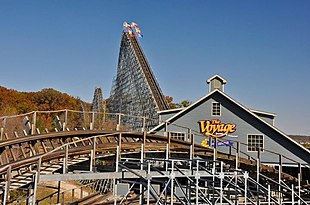 View of the station, lift hill, and other ride elements on The Voyage