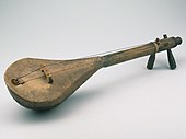 Morocco, pre-1981, skin-topped lute, carved wooden bowl, Amazigh, Amazighen, Berber cultures. Called "Lothar". Labeled "Gimbrī" in Koptishe Lauten (Ricardo Eichmann, 1994, page 101)