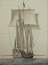 A sailing ship with raised sails seen from the stern. Along its sides it has a single row of cannons. Between the gunports, a single row of large oars is protruding.