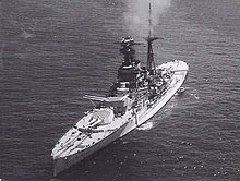 Black and white photograph of a warship