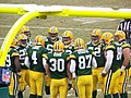 Packers offense in a huddle, week 17