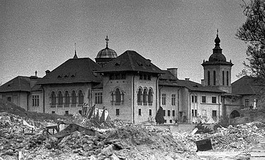 Mihai Vodă Monastery, Bucharest, founded in 1594, demolished in 1985-1986 while the church and the bell tower were moved 270 meters from their initial place to be saved, by engineer Eugeniu Iordăchescu behind 1980s apartment buildings, unknown architect[128]