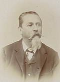 Black-and-white photographic portrait of Pietro Tacchini