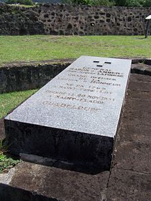 Photo shows a large tombstone with the name Jean Jacques Ambert.