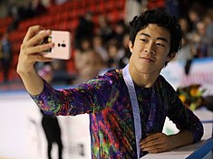 A photograph of Nathan Chen taking a selfie.