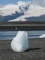 An iceberg with Vatnajokull in the background