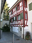 Altstadthaus in Stadtmauerrest integriert III/15, Wohnhaus mit Gewerbe