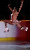 A skater performs a double stag jump.