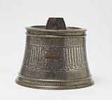 Mamluk-era in Egypt candlestick base, c1240, brass with silver, gold and copper inlays