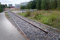 Alte Gleise am ehemaligen Bahnsteig, die an den Hannoverschen Bahnhof und die nationalsozialistischen Gräuel erinnern