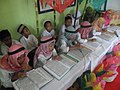 Children read Qur'an in Indonesia.