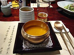Hobak-juk served in a bangjja bowl