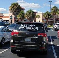 An automobile with the slogan written on the rear glass, parked in The Villages, Florida