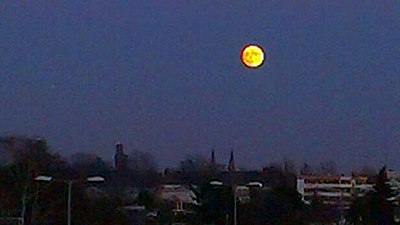 Near full moon over Berlin, Germany, in December 2015, approximately 30 minutes after moonrise