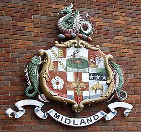 Arms of Midland Railway at Derby station, bearing in crest a wyvern sans legs