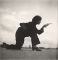 Woman training for a Republican militia by Gerda Taro, Somorrostro Beach, La Barceloneta (1936).