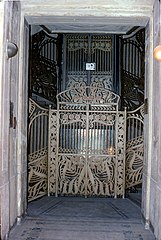 Elevator cage of Maiolica House (1898)