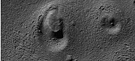 Close view of ring mold crater, as seen by HiRISE under HiWish program Note: this is an enlargement of the previous image of a field of ring mold craters.