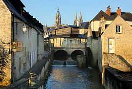 The historic centre, the Bayeux Cathedral, the Aure and tourist office