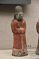 Example of a female attendant wearing an early Xianbei garb, the opening is zuoren, unearthed in Sima Jinlong tomb, Northern Wei, 484 AD.[96]