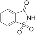 Saccharin, a cyclic sulfonamide that was one of the first artificial sweeteners discovered