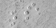Close view of cones, as seen by HiRISE under HiWish program. These cones probably formed when hot lava flowed over ice-rich ground.