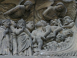 Detail on the south portal depicting angels looking down upon hell