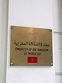 Plaque outside the embassy in Arabic and English with the flag of Morocco