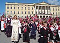 The children's parade passes the Royal Palace during the Norwegian Constitution Day