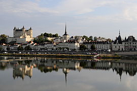 The chateau, the church of Saint-Pierre-du-Marais and the town hall, seen from across the Loire