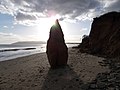 Small sandstone rock pinnacle at Yaverland, Isle of Wight, UK, formed as a result of cliff erosion