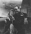 Bob Hope and Patty Thomas in Germany in 1945 on USO tour, in front of a transport plane, Thomas had an infected wisdom tooth in this photo. Thomas went to a Paris hospital for a few days and then rejoined the tour.