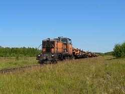 Locomotive TU6A-3809 with freight train