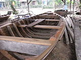 Boat nearing completion with frames added, Hội An